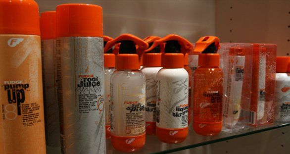 A shelf full of bottles including one that says dry up