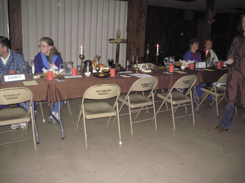 table and chairs set with candles