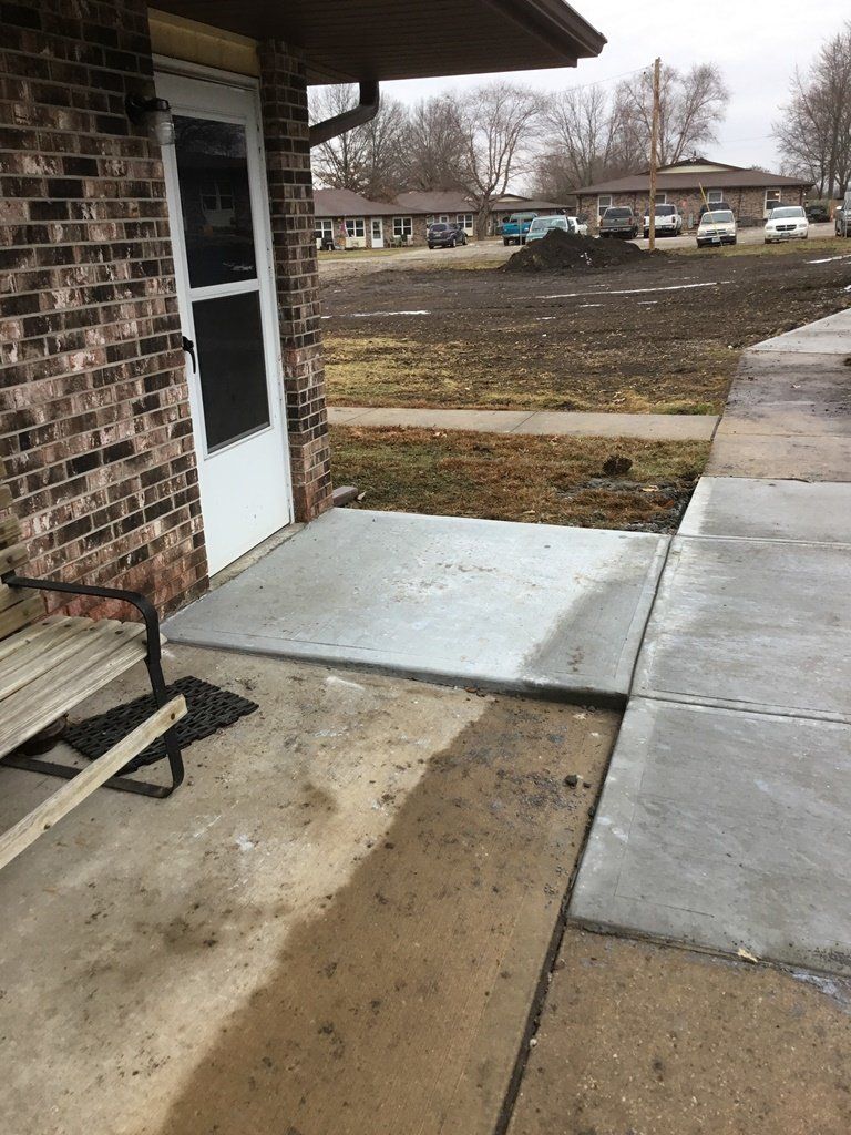 Cemented Yard — Skid Loader in Lincoln, MO