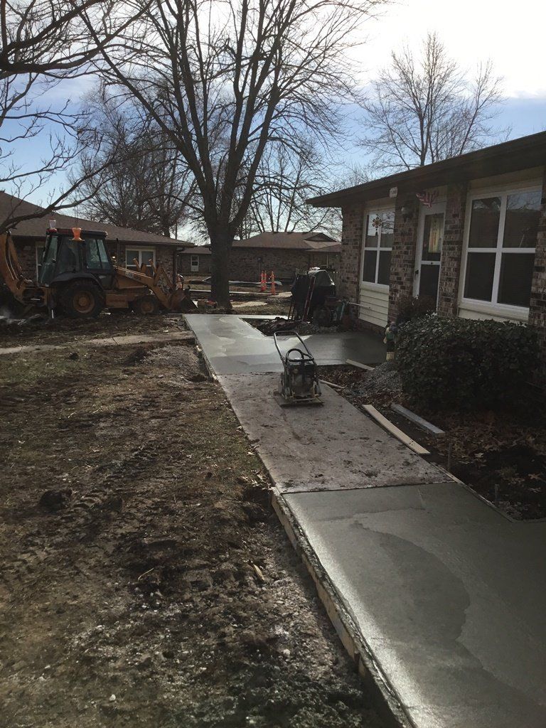 House Sidewalk — Skid Loader in Lincoln, MO