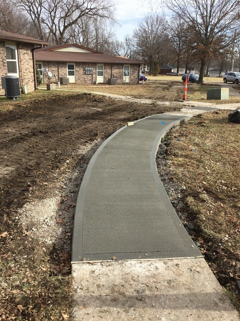 Curve Road — Skid Loader in Lincoln, MO