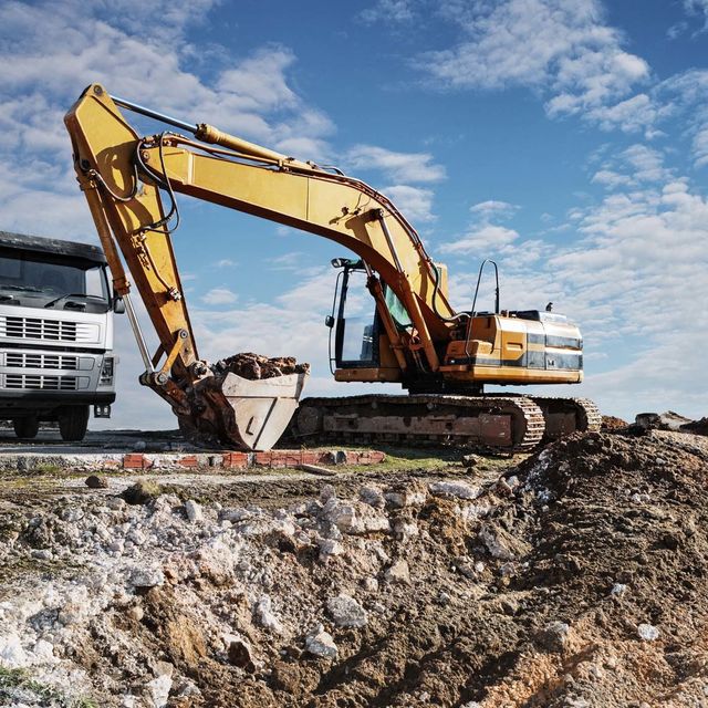 Yellow Excavator — Excavating in Lincoln, MO