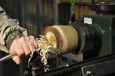 Wood vase being turned on the lathe