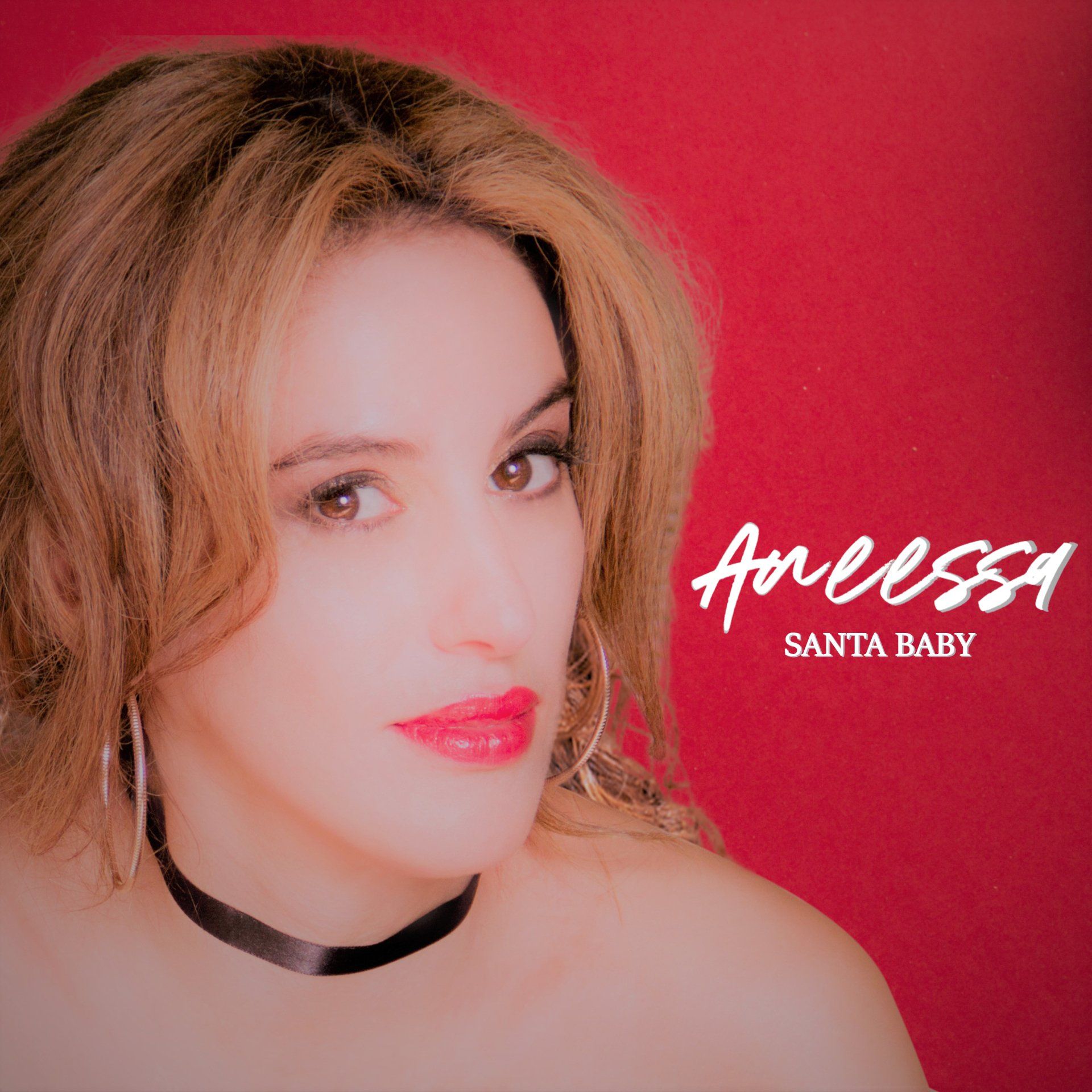 Portrait of a woman with blonde hair against a bright red background, with “Anessa Santa Baby” text nearby