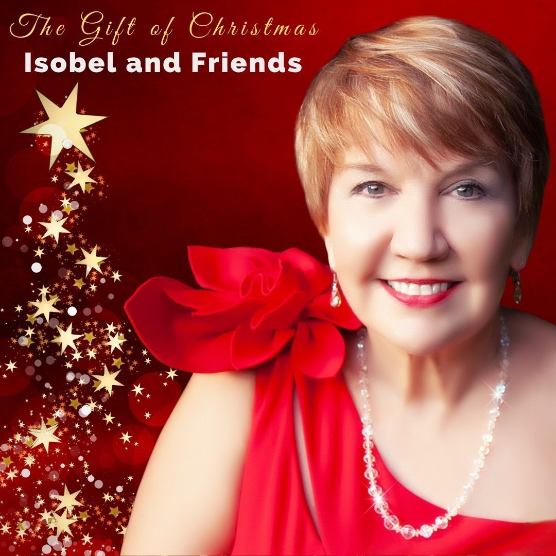 A woman in a red dress is on the cover of the gift of christmas
