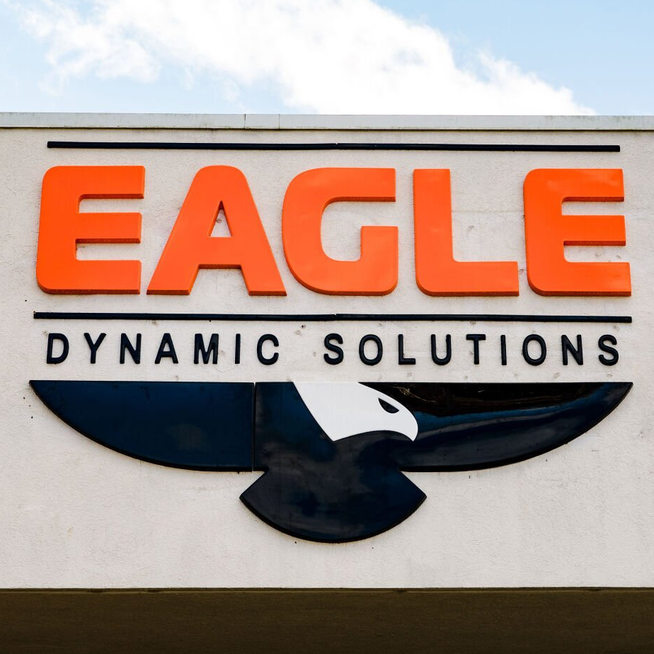 An eagle dynamic solutions sign with an eagle on it