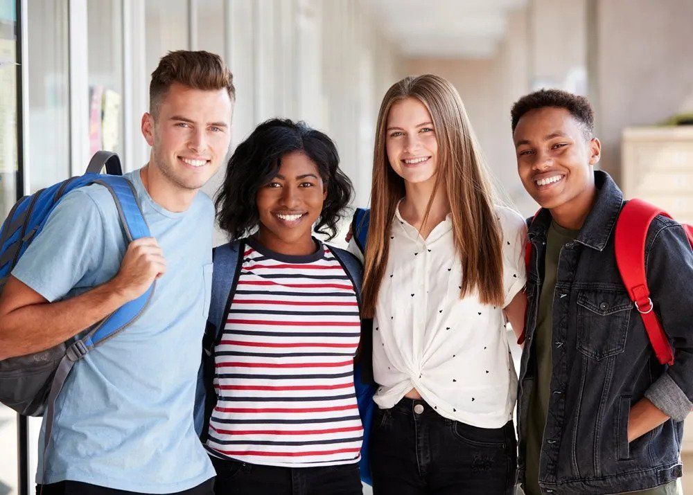 College Student Friends in Corridor of Building — Greenville, SC — McMaster Law Firm LLC