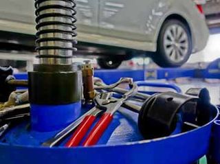 Repairing Car on Auto Shop — Tune-Up Service in Ocean City, NJ Repairing Car on Auto Shop — Tune-Up Service in Ocean City, NJ