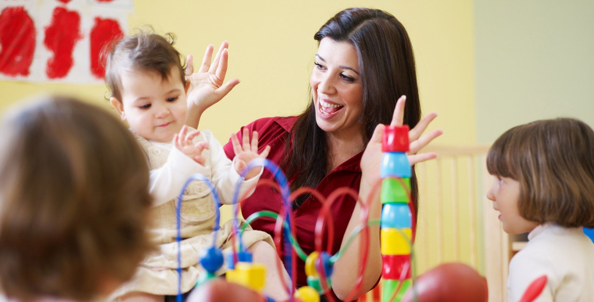 children playing with teacher