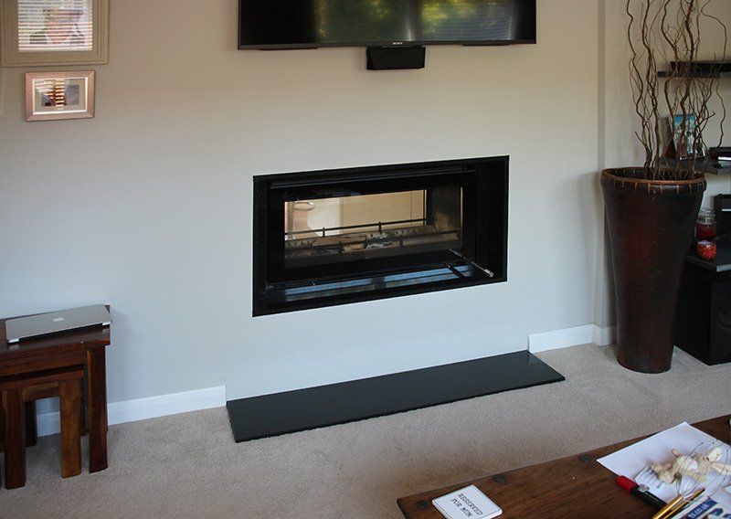 Minimalist room with electric fireplace