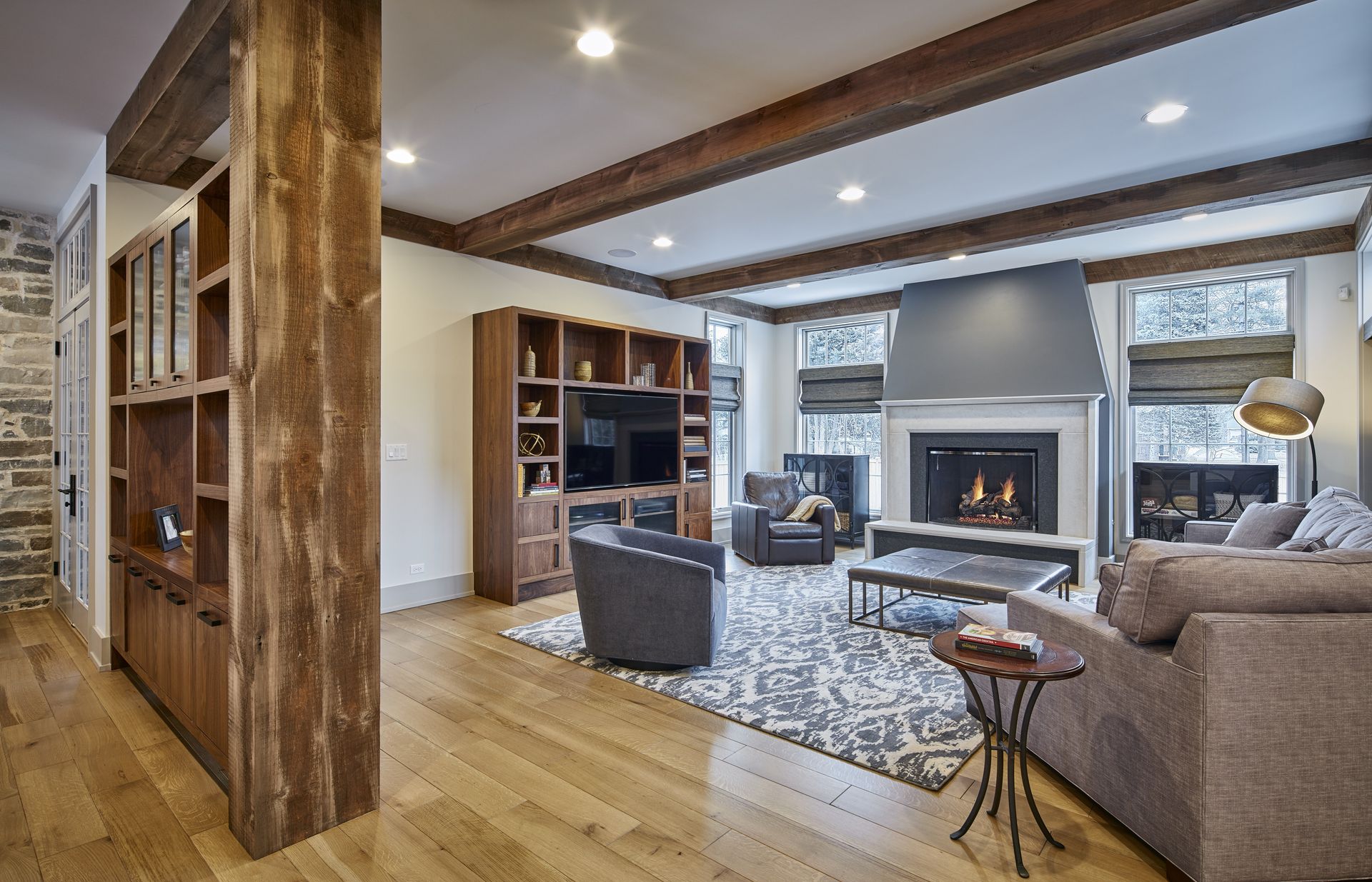 A living room with a fireplace and a couch