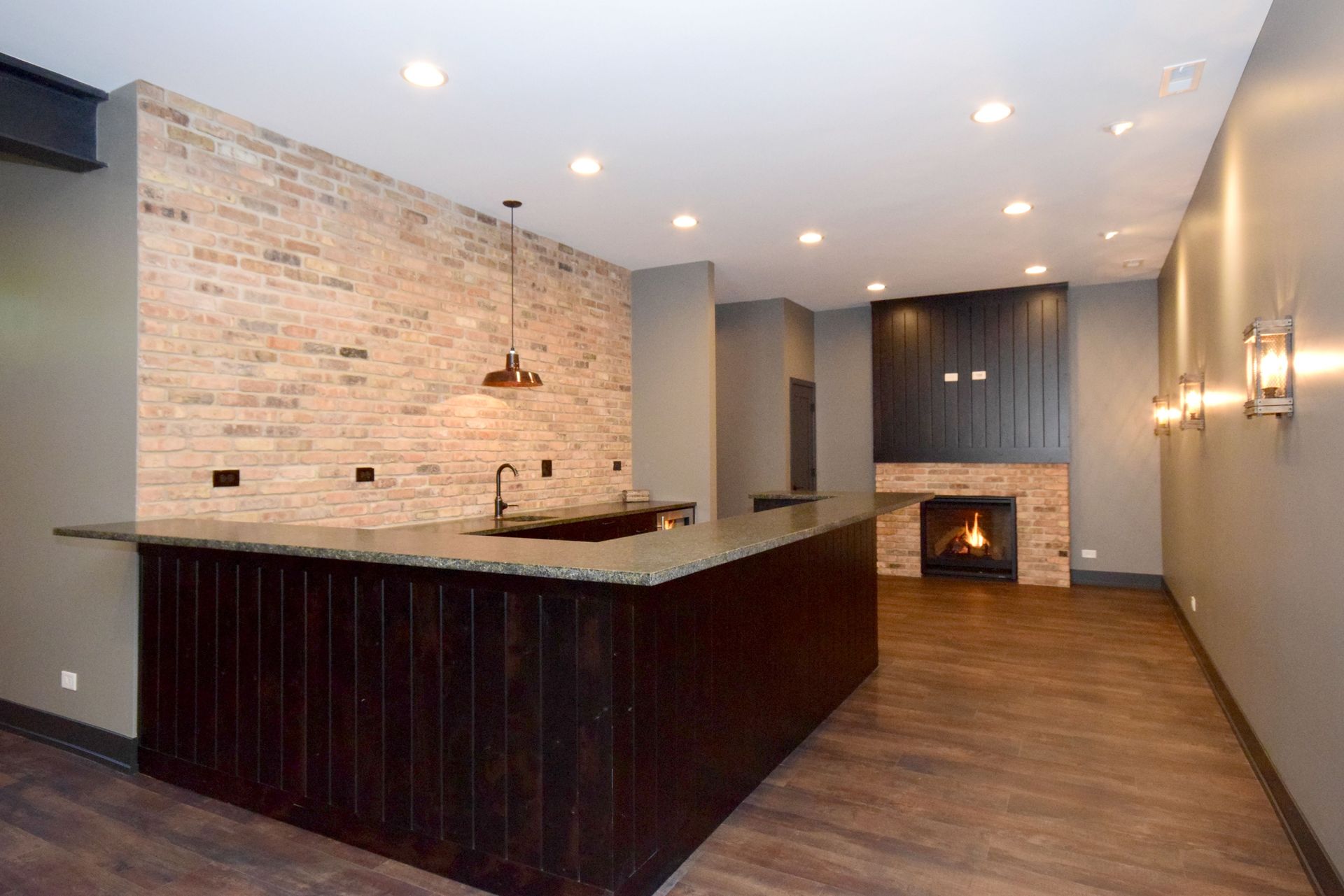There is a fireplace in the middle of the room.