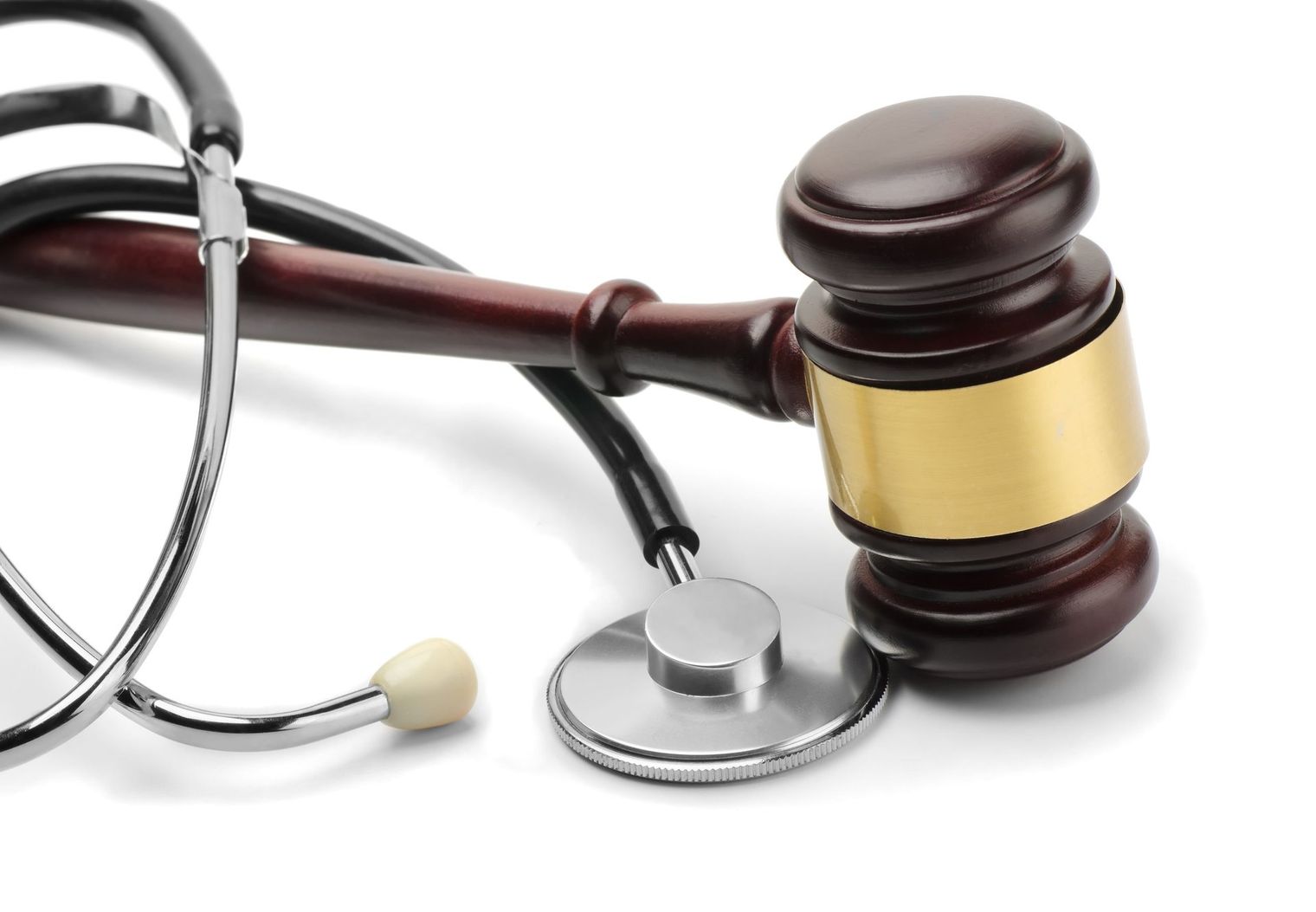A wooden judge 's gavel with a stethoscope attached to it
