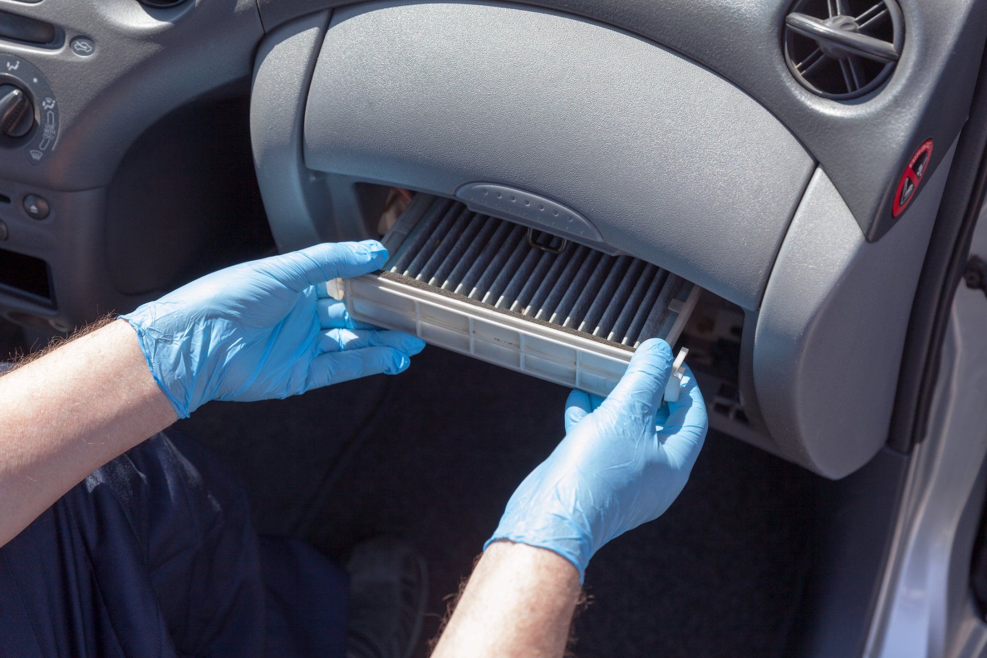 Broken Glass — Replacing the cabin air filter in Warminster, PA Broken Glass — Replacing the cabin air filter in Warminster, PA