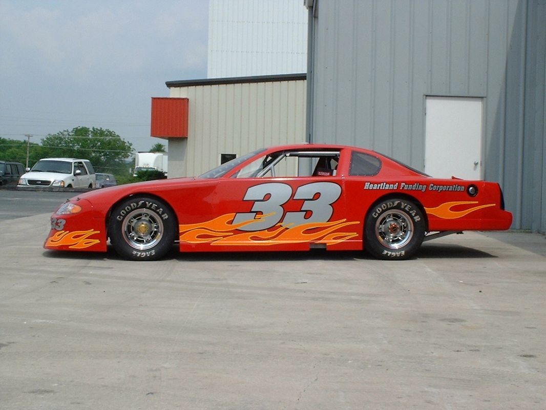 Orange Sports Car — Springfield, MO — Stripes and Stuff Graphics