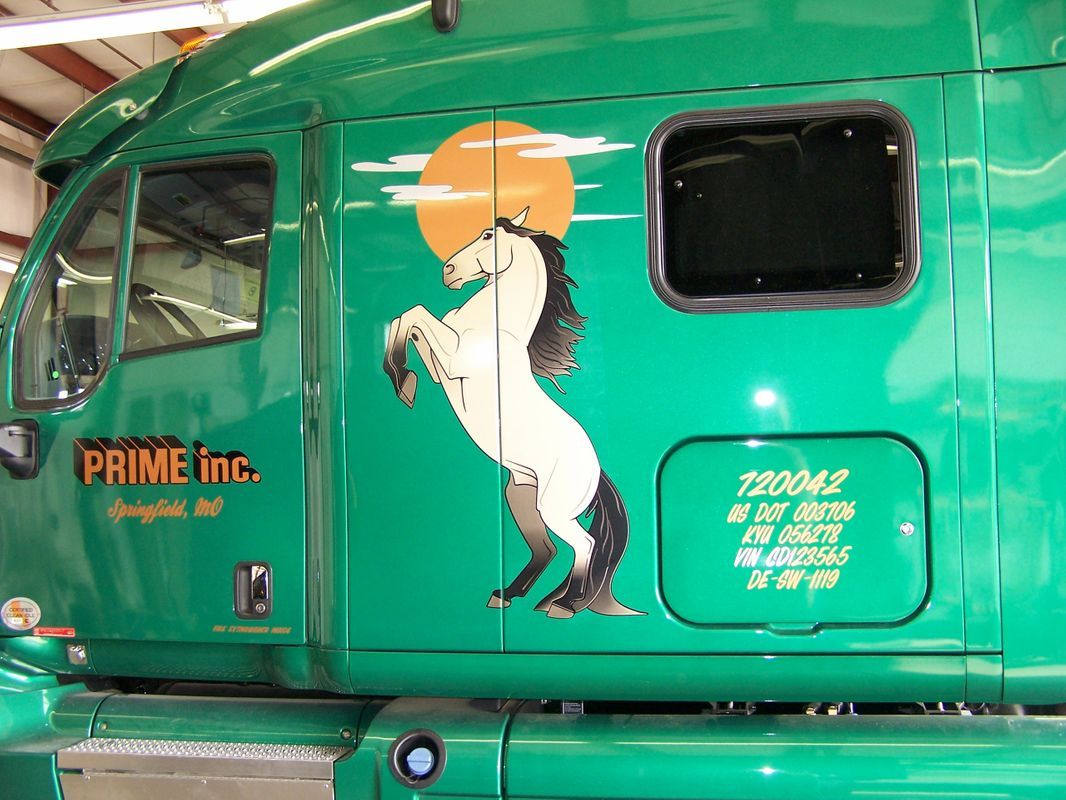 Green Truck With Pony Logo — Springfield, MO — Stripes and Stuff Graphics