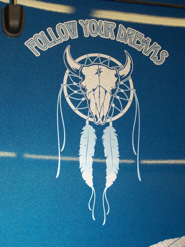 Blue Vehicle With Bull Horn Logo — Springfield, MO — Stripes and Stuff Graphics