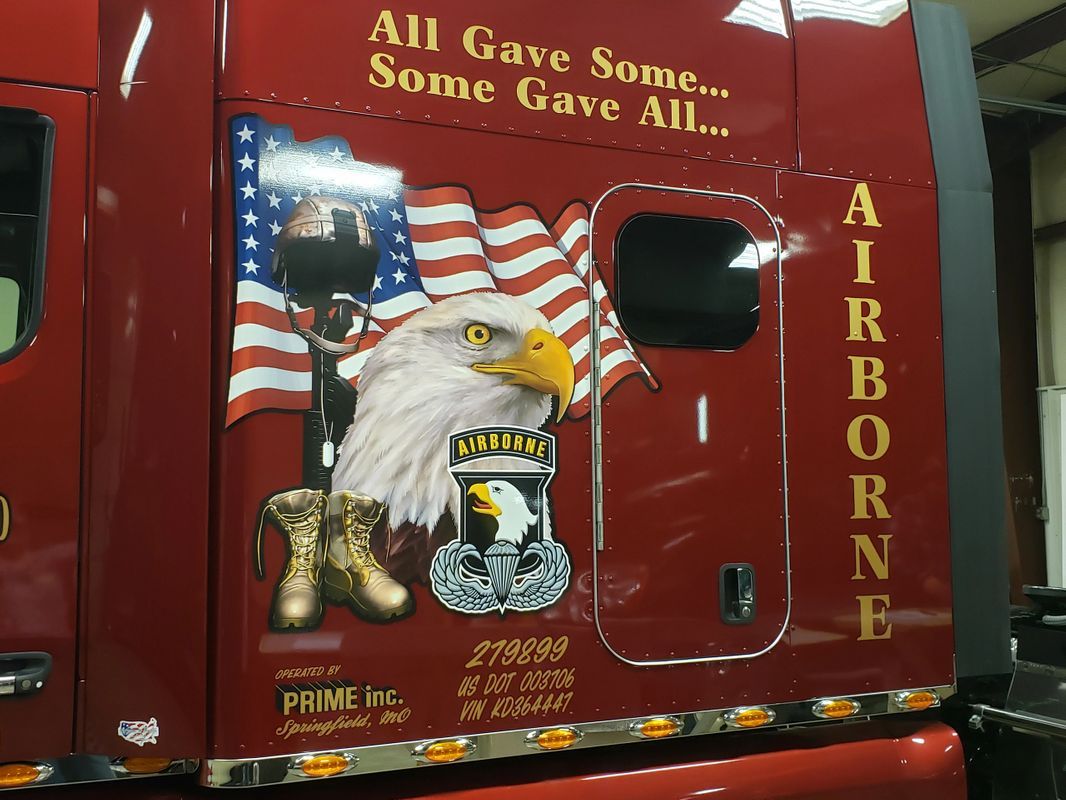Red Vehicle With Eagle Logo Design — Springfield, MO — Stripes and Stuff Graphics