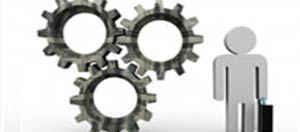 Three gears with a business figure holding a briefcase.