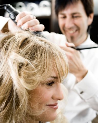 Woman gets her hair done at a hair salon in Armadale