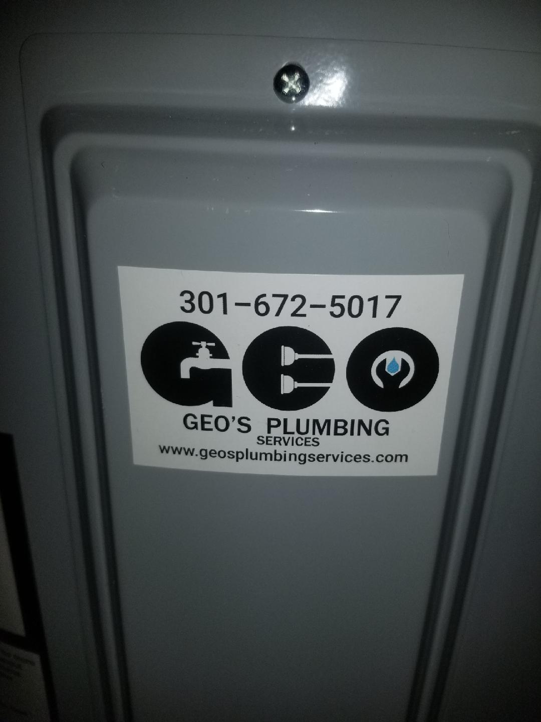 A geo 's plumbing sticker on a door