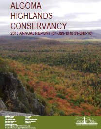 Algoma Highlands Conservancy 2010 annual report cover, showing forested landscape under a cloudy sky.