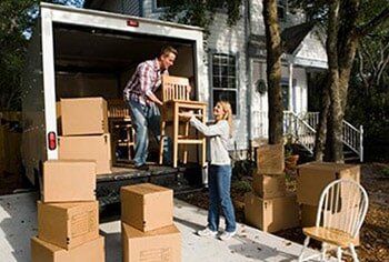 Moving Chairs and Boxes — Moving Services in Brooklyn, NY Moving Chairs and Boxes — Moving Services in Brooklyn, NY