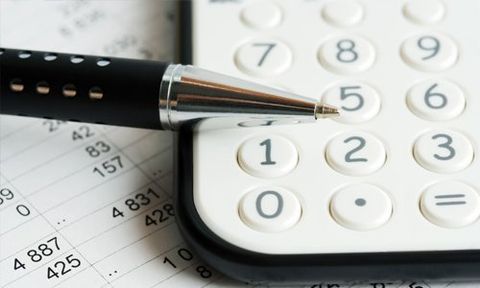 calculator and a pen