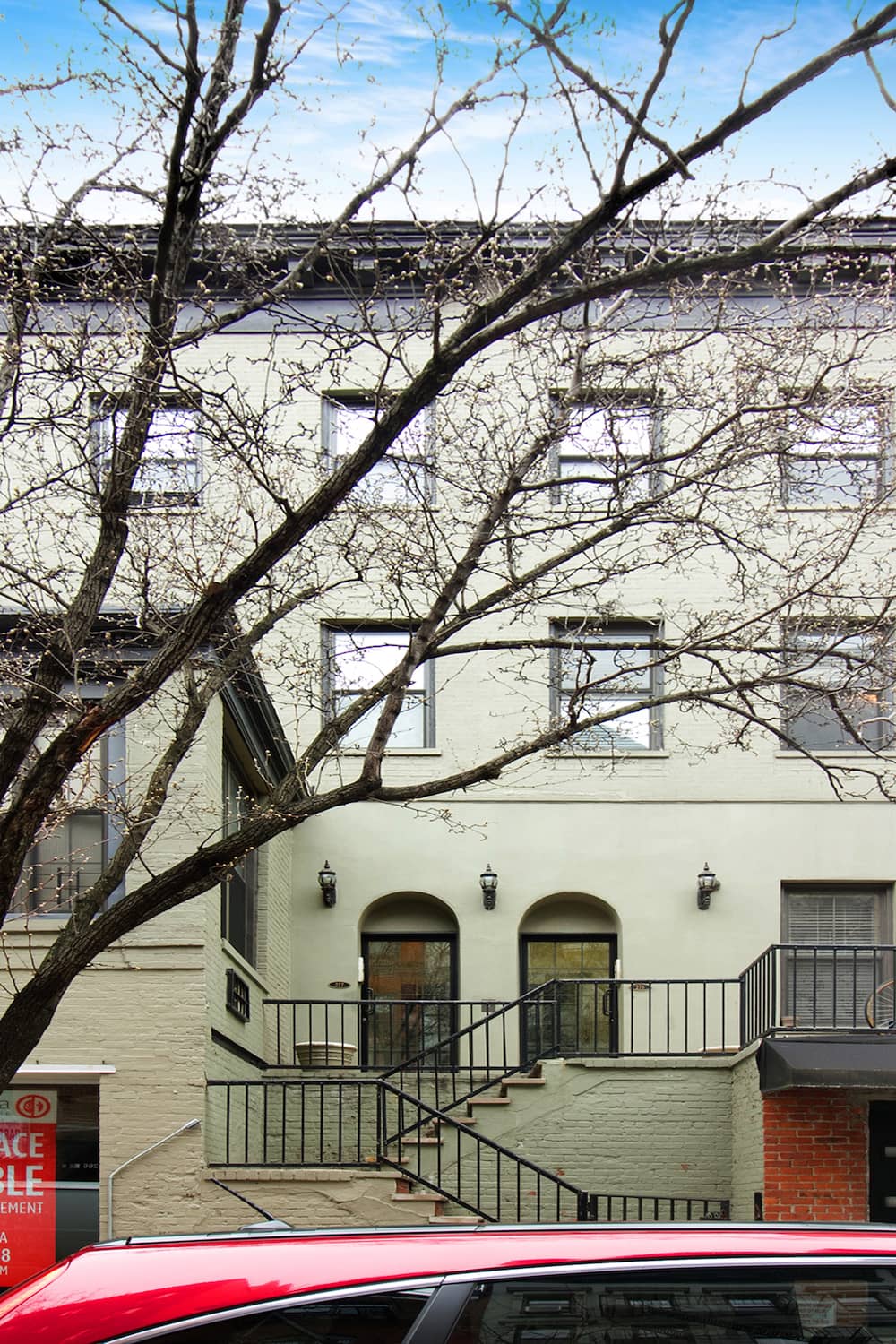 Prime Chelsea Charming residential mixed use building nestled on a prime tree-lined block with unique raised, gated building entranceway.
