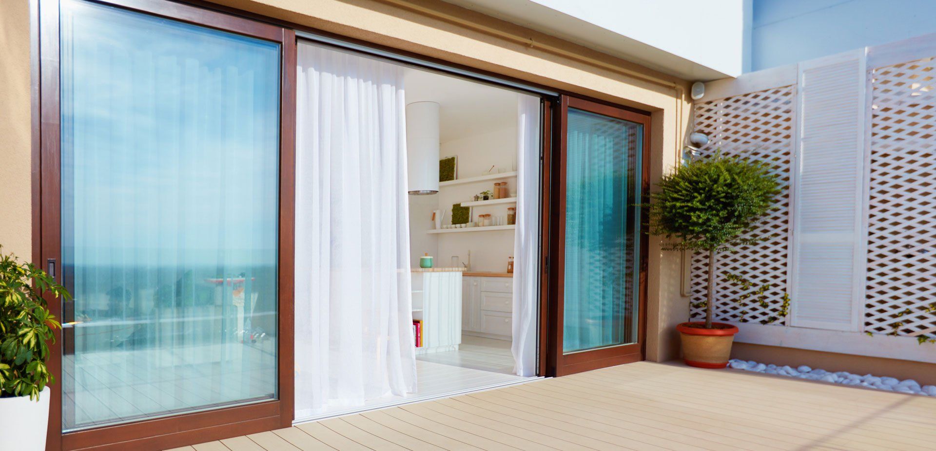 large sliding glass doors opening onto relaxing patio