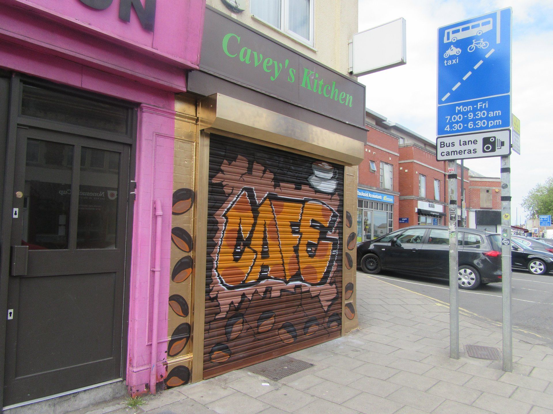 Graffiti on a roller shutter Gloucester Rd