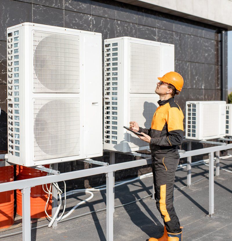 Technician Checking HVAC — Central Florida — A-Excellent Service Inc
