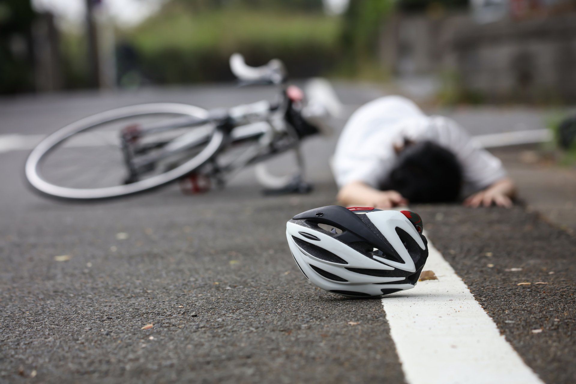 Bike Rider on the Ground — Columbus, GA — The Law Office of Paul Bennett Bike Rider on the Ground — Columbus, GA — The Law Office of Paul Bennett