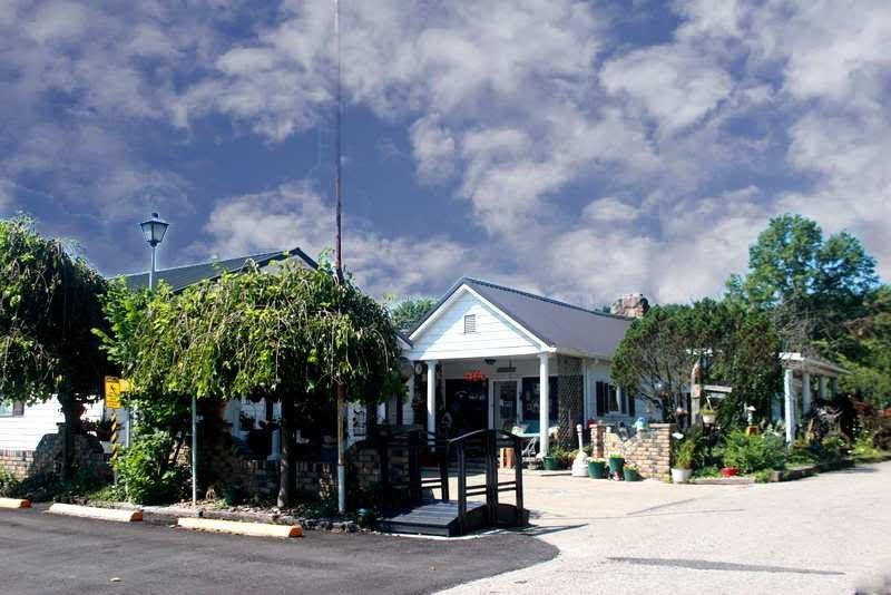 Beautiful White House with Trees — Byesville, OH — Country Court Mobile Home Park