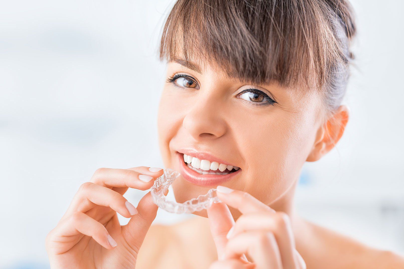 woman and invisible braces