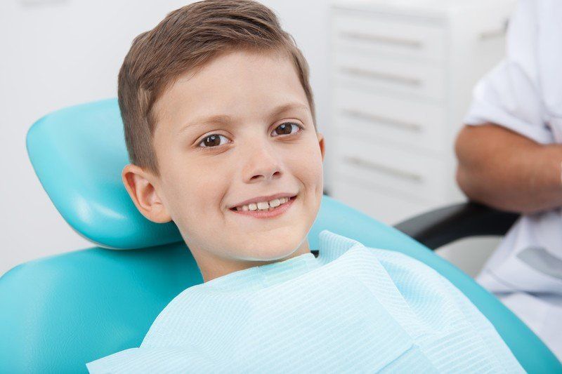 kid at dentist