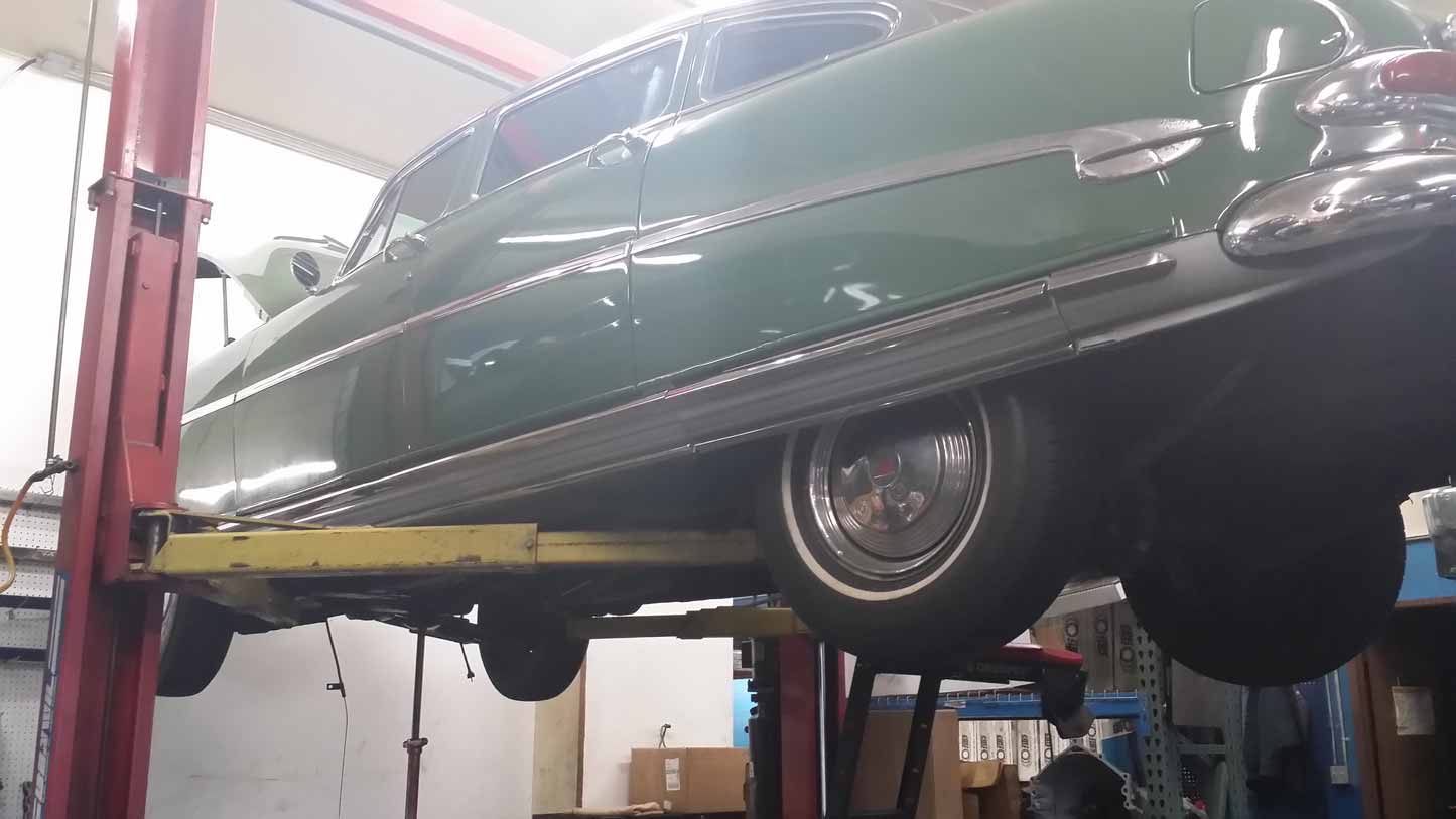 Step 01: After extensive road test, transmission is removed from 1952 Hudson Hornet