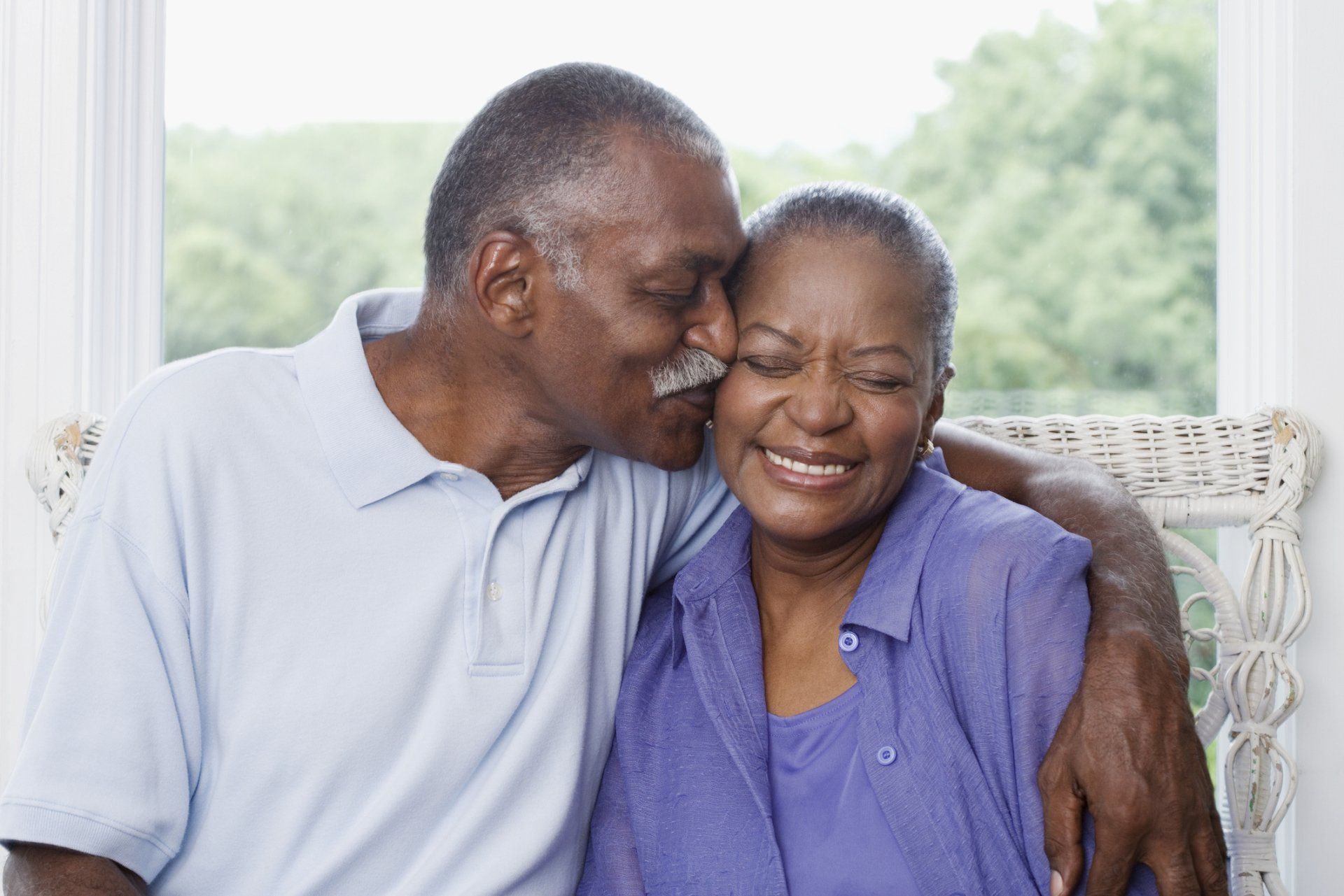 Senior Couple Together with Insurance Agent — Evansdale, IA — Lunde Insurance Service, LLC