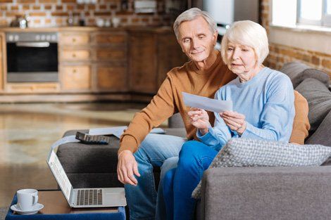 Pension — Serious Elderly Couple Checking Financial in Renton, WA