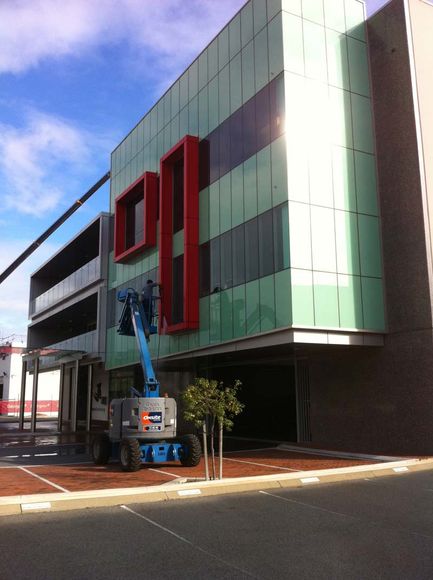 cleaning windows on stand
