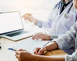 Doctor Presenting Results with the Patient — Family Medical Clinic in Asheville,NC
