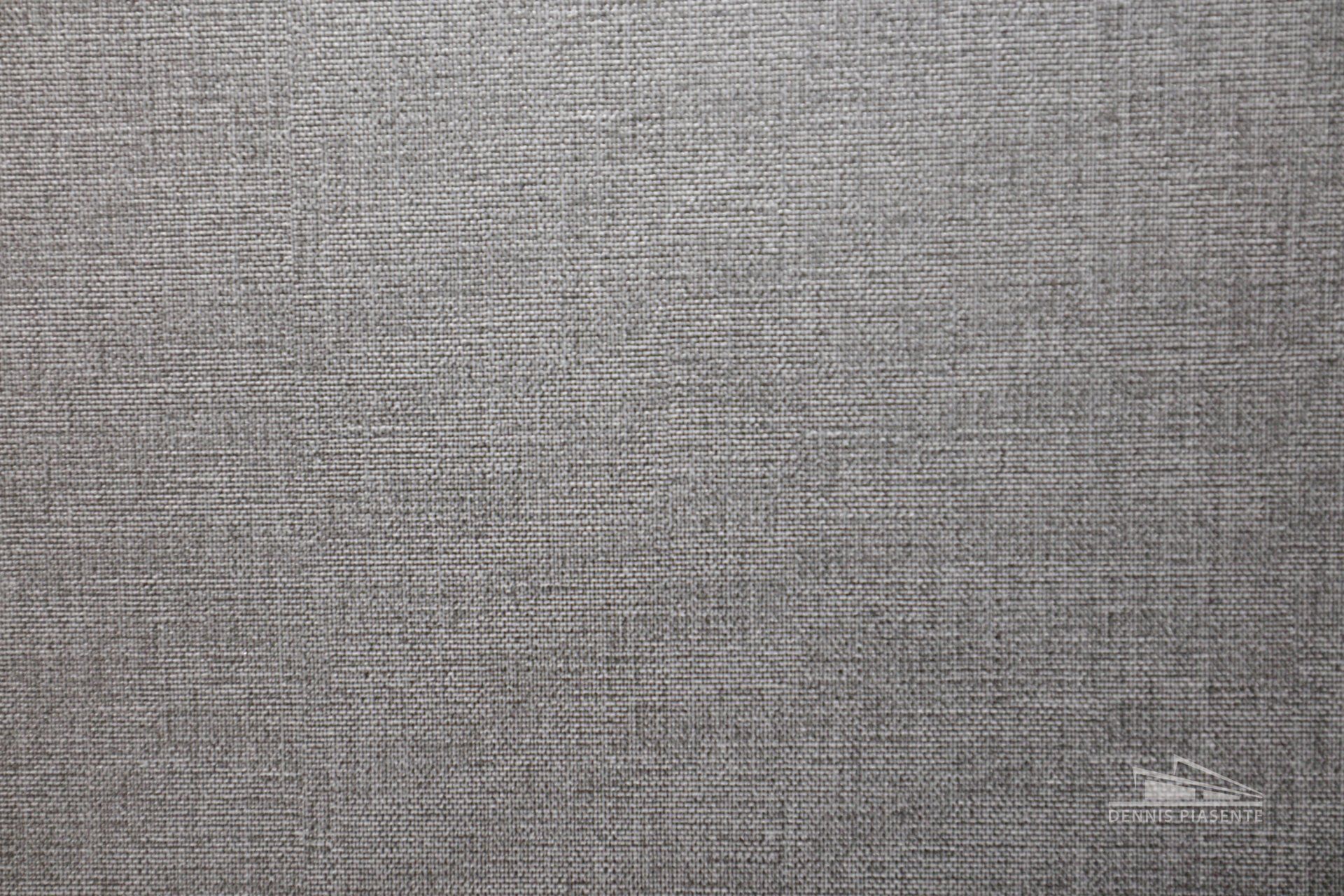A close up of a gray fabric texture.