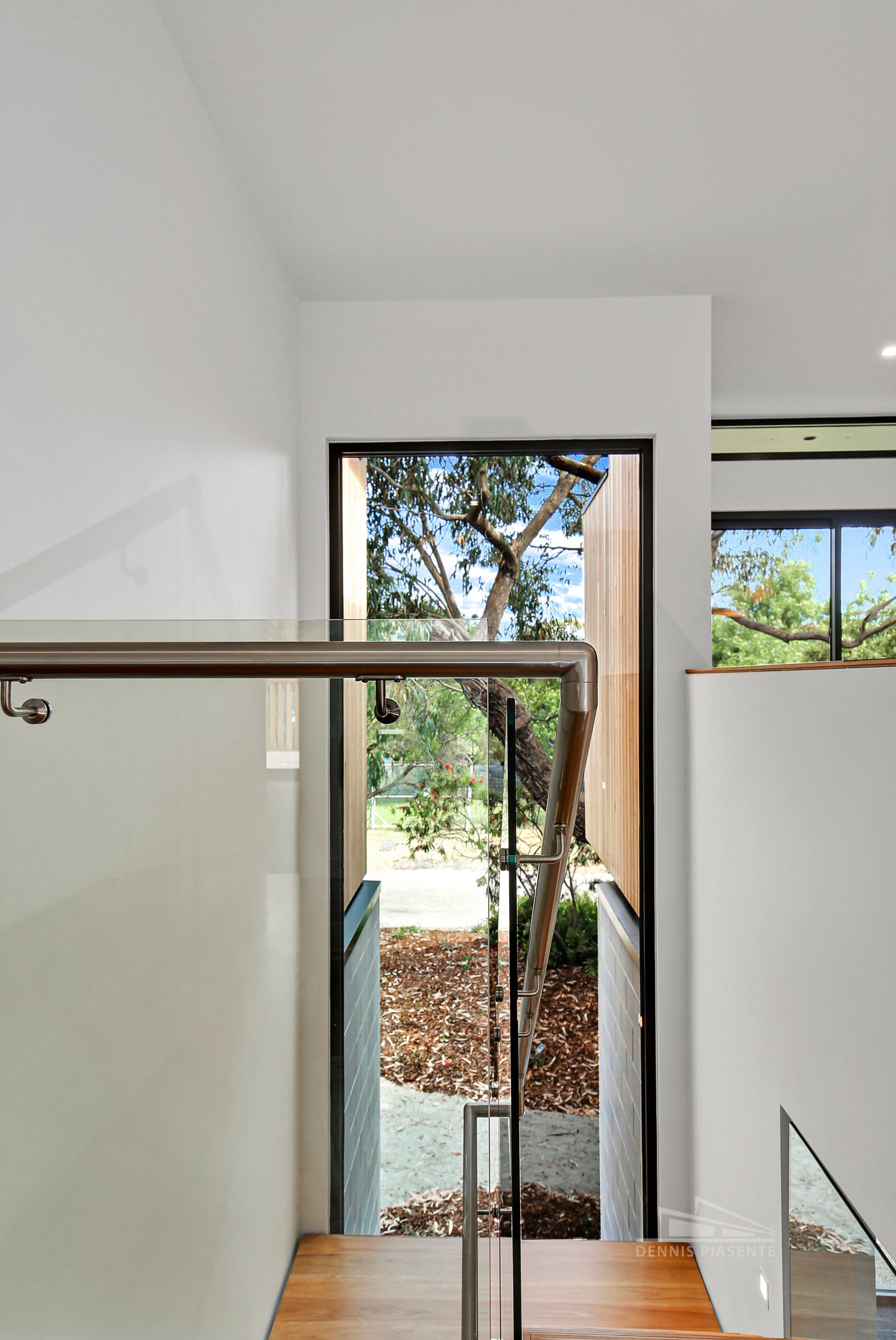 There is a staircase leading up to the second floor of a house.