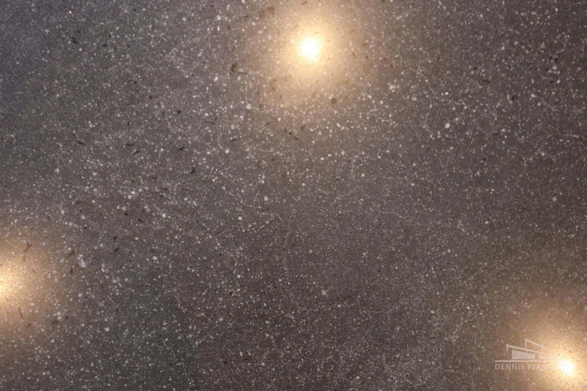 A gray background with a few stars in it