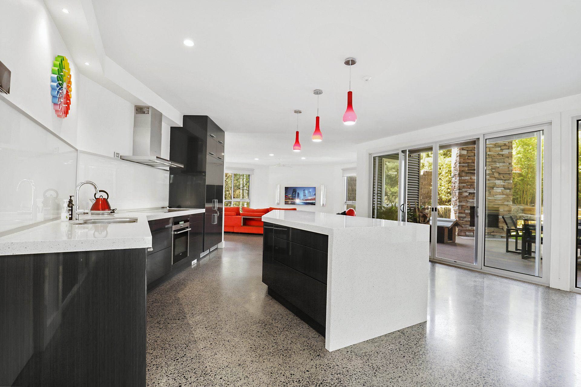 A kitchen with a large island in the middle of it