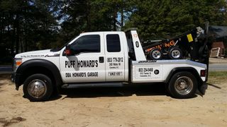 Close up of a Car Being Towed — Tow Towing company in Columbia, SC Close up of a Car Being Towed — Tow Towing company in Columbia, SC