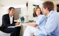 An auditor and his clients talking about accounts