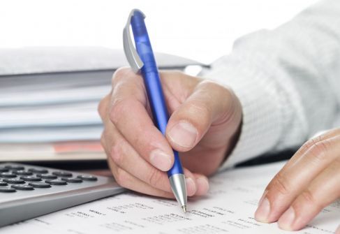 An tax agent performing taxation services in Enfield
