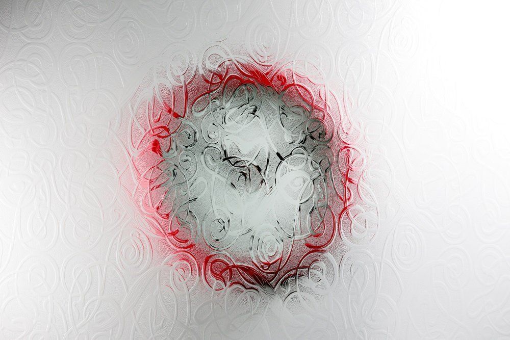 red wall clock with a Everglade design