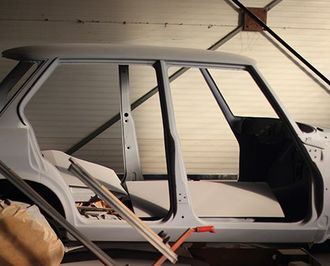 Sand blasting a metal - Powder Coating & Sand Blasting in Kent, WA
